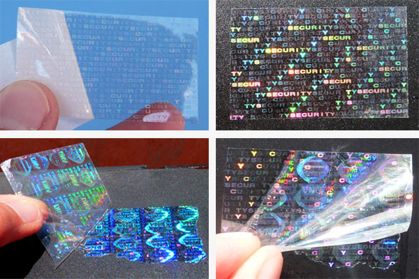Transparente Hologrammfolie, bei der bei Ablöseversuchen ein verstecktes Hologramm-DNA-Motiv erscheint