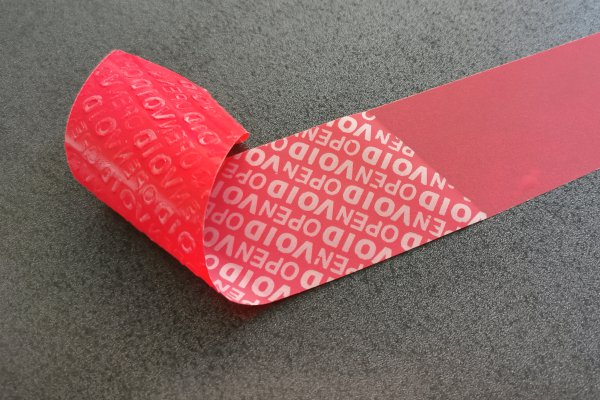 Rotes Siegelband Security-Tape mit ablösbarem Klebstoff und rückseitigem VOID-Sicherheitseffekt