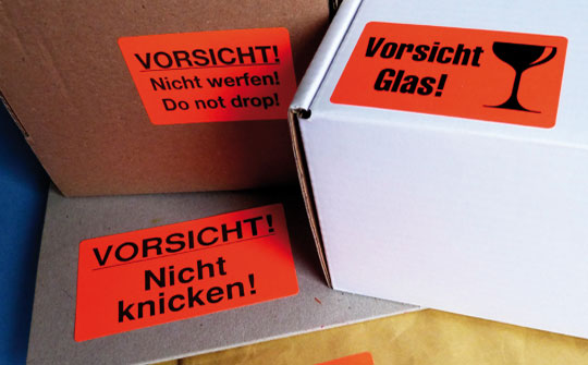 Verpackungsetiketten, Warn- und Hinweisaufkleber aus auffälligem Leuchtrotpapier