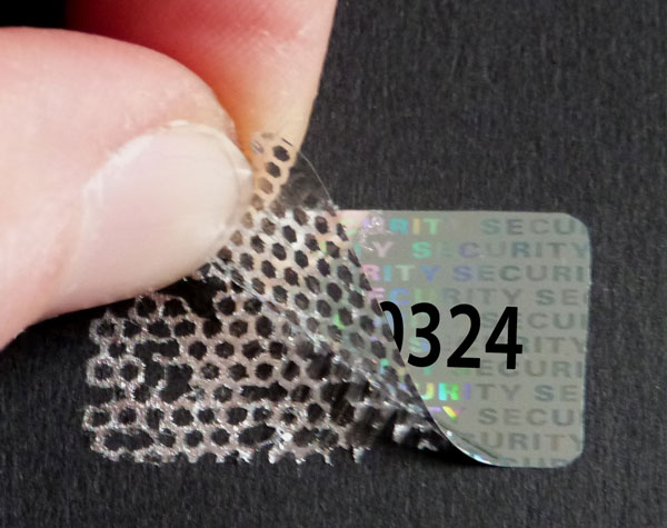 Nummerierte Hologrammetiketten mit Wabenmuster-Effekt gegen unerwünschtes Ablösen  Hologrammfolien Aufkleber mit fortlaufender  Nummerierung und rückseitigem Wabenmuster-Sicherheitseffekt