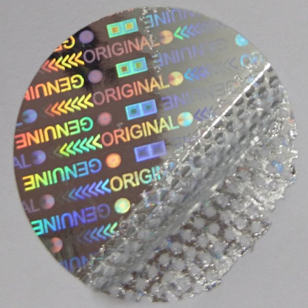 Hologrammsiegel mit rückseitigem Wabenmuster gegen unerlaubtes Ablösen Hologrammaufkleber ORIGINALGENUINE mit Sicherheitseffekt im Wabenmuster, das bei Ablöseversuchen ausgelöst wird