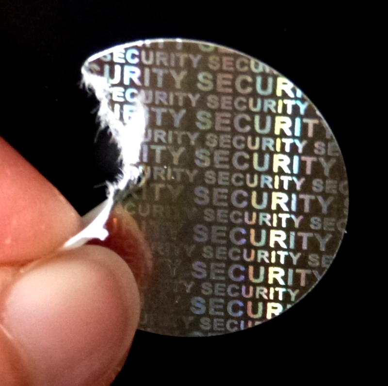 Verschluss-Siegel aus Security-Hologrammpapier Security-Sicherheitshologramm aus glänzend silbernem Papier als Verschlussetiketten