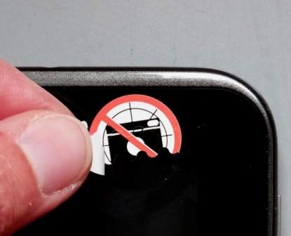 Fotoverbot-Siegel mit Sicherheitsstanzung zum Schutz vor unbemerktem Ablösen von Handykameras